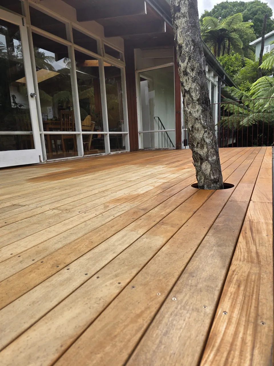 Hardwood decking beneath the covered outdoor area