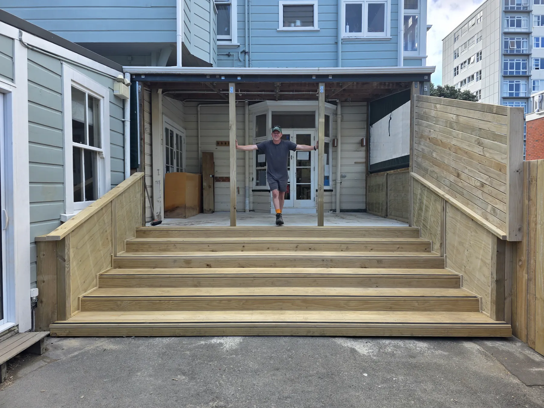 Wide timber steps leading to the covered outdoor play area